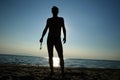 Man on the beach over sea sunset Royalty Free Stock Photo