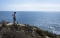 A man on the beach,watching the ocean Royalty Free Stock Photo