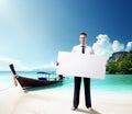 Man on the beach whith empty board in hand Royalty Free Stock Photo