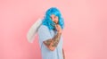 man with beard and blue peruke acts like an agel with wings Royalty Free Stock Photo
