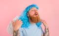 man with beard and blue peruke acts like an agel with wings Royalty Free Stock Photo