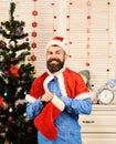 Man with beard in blue shirt. Celebration and gift Royalty Free Stock Photo