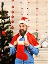 Man with beard in blue shirt. Santa with cheerful face Royalty Free Stock Photo