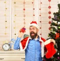 Man with beard in blue shirt. Santa with happy face Royalty Free Stock Photo