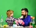 Man with beard and child plays with soap suds. Royalty Free Stock Photo