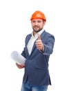 A man with helmet , shows of a large pallet up and holds a roll of whatman paper. . Royalty Free Stock Photo