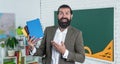 man with beard and moustache look as businessman or teacher in college or school, recommendation