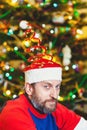 Man with beard in New Year cap Royalty Free Stock Photo