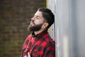 Man with beard standing outdoors alone Royalty Free Stock Photo