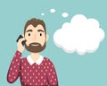 A man with a beard in a sweater over his shirt talking on a mobile phone. Dream bubble Royalty Free Stock Photo