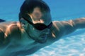 Man with Beard Underwater swimming pool Young beard man with glasses Underwater Royalty Free Stock Photo