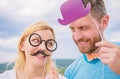 Man with beard and woman having fun party. Add some fun. Making funny photos birthday party. Just for fun. Humor and