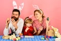 Man with beard, woman and kid with happy faces