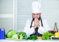 Man bearded chef getting ready cooking delicious dish. Chef at work starting shift. Guy in professional uniform ready Royalty Free Stock Photo