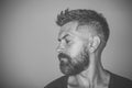 Man with bearded face profile and stylish hair