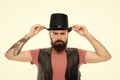 Man bearded hipster cylinder hat. Illusionist performance concept. Magician sorcerer genie performance. Circus worker Royalty Free Stock Photo