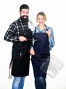 Man bearded hipster and girl ready for barbecue white background. Backyard barbecue party. Family bbq ideas. Couple in