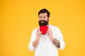 Man bearded hipster hold red heart. Health care concept. Check helps understand risk factors for heart disease. Doing