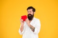 Man bearded hipster hold red heart toy. Medicine concept. Listen to your heart. Health Check helps understand risk