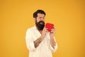 Man bearded hipster hold red heart toy. Medicine concept. Listen to your heart. Health Check helps understand risk