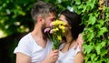 Man bearded hipster kisses girlfriend. Couple love romantic date nature background. Love romantic feelings. Couple in Royalty Free Stock Photo