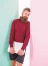 Man bearded hipster worker with laptop lean on wall. Guy web developer programmer or designer. Common thought designers Royalty Free Stock Photo