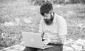 Man bearded with laptop sit meadow nature background. Blogger becoming inspired by nature. Writer looking for