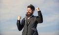 Man bearded optimistic businessman wear formal suit sky background. Success and luck. Optimistic mood. Think like Royalty Free Stock Photo