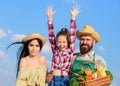 Man bearded rustic farmer with kid and wife. Family father farmer mother gardener with daughter near harvest. Family