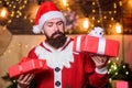 Man bearded santa celebrate christmas with presents. May your home be filled with all joys of season. New year Royalty Free Stock Photo