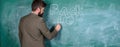 Man bearded teacher missed his work during vacation. Teacher near chalkboard holds chalk write inscription back to Royalty Free Stock Photo