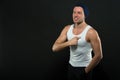 Man beat chest. Macho with angry face. Athlete in casual vest and hat with hand gesture. Power and energy. Argument or