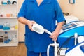 Man beautician doctor at work in spa center. Professional cosmetologist in cosmetology cabinet or beauty parlor Royalty Free Stock Photo