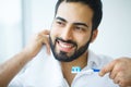 Man With Beautiful Smile, Healthy White Teeth With Toothbrush. H Royalty Free Stock Photo