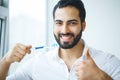 Man With Beautiful Smile, Healthy White Teeth With Toothbrush. H Royalty Free Stock Photo