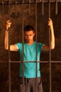 Man behind the bars Royalty Free Stock Photo