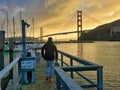 Man from behind looking to golden gate bridge Royalty Free Stock Photo