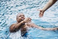 Man being rescued from the water