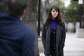 Man Harassing Woman on the Street or a Criminal Stalking Victim Royalty Free Stock Photo