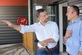 Man being trained to use fire extinguisher Royalty Free Stock Photo