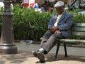 The man on the bench.