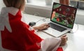 Man betting on sports using laptop at table, closeup. Bookmaker website on screen Royalty Free Stock Photo