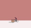 Man on bicycle cart delivering goods on pink street. Courier traveling with his cargo bike. Royalty Free Stock Photo