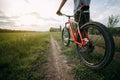 Man with bicycle at country road enjoying sunset Royalty Free Stock Photo