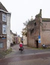 Man on bicycle enters old city of zwolle in holland