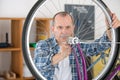 Man bicycle mechanic repairing bicycles Royalty Free Stock Photo