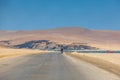 Man on bicycle , Paracas National Reserve desert, Pisco, Peru 2019-12-05.