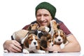 The man and big group of a beagle puppies Royalty Free Stock Photo