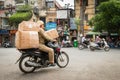 Man on bike with boxes for delivery