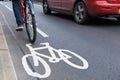 Man On Bike Using Cycle Lane As Traffic Speeds Past